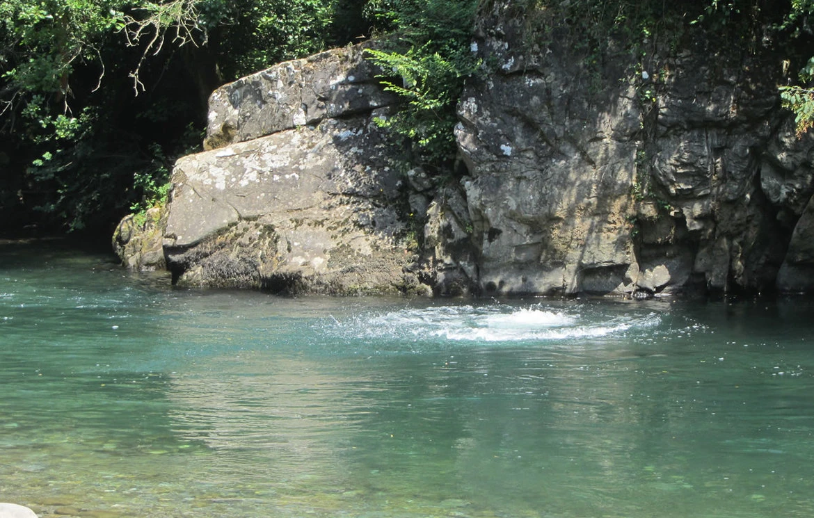 Clear turquoise wild swimming spot in the local river gorge