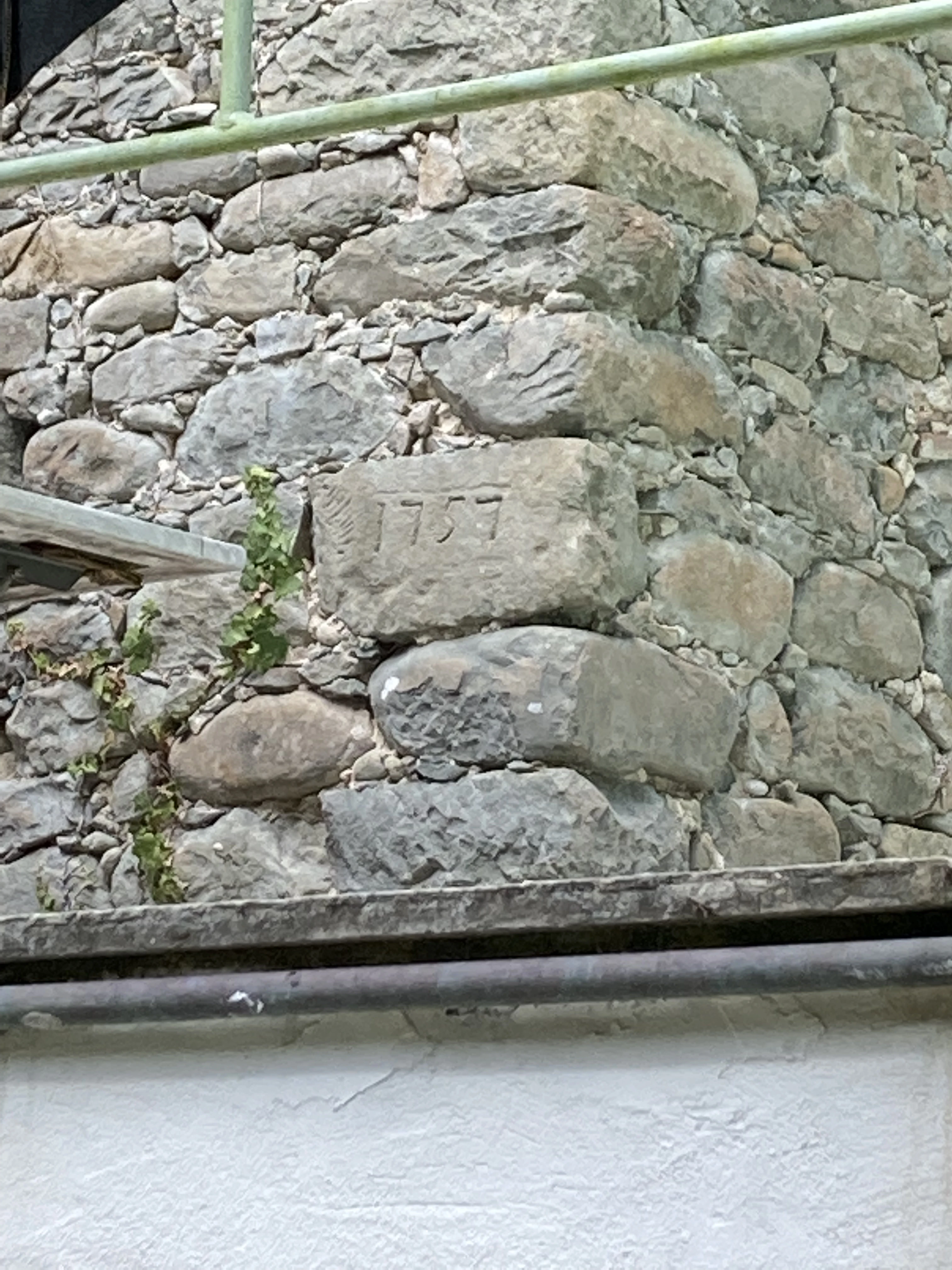 Close view of the old stonework and water channel at the mill